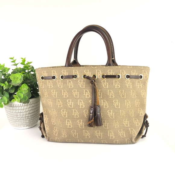 Dooney & Bourke Handbags - Dooney & Bourke Signature Logo Canvas/Leather Tassel Bag